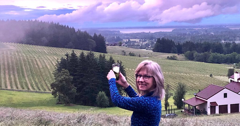 My Story page: Pam Spettel of 101-Mile Kitchen photographing a view of the Southern Willamette Valley from her house.
