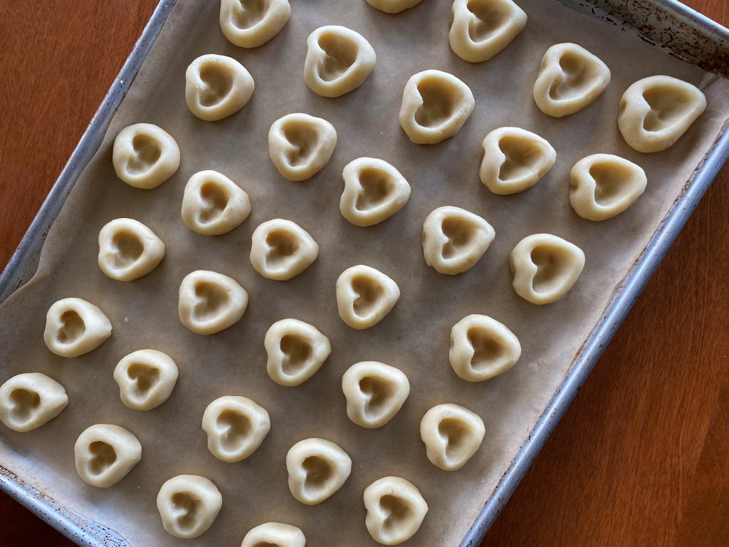 Unfilled Valentine Shortbread Heart Cookies on baking tray, before baking.